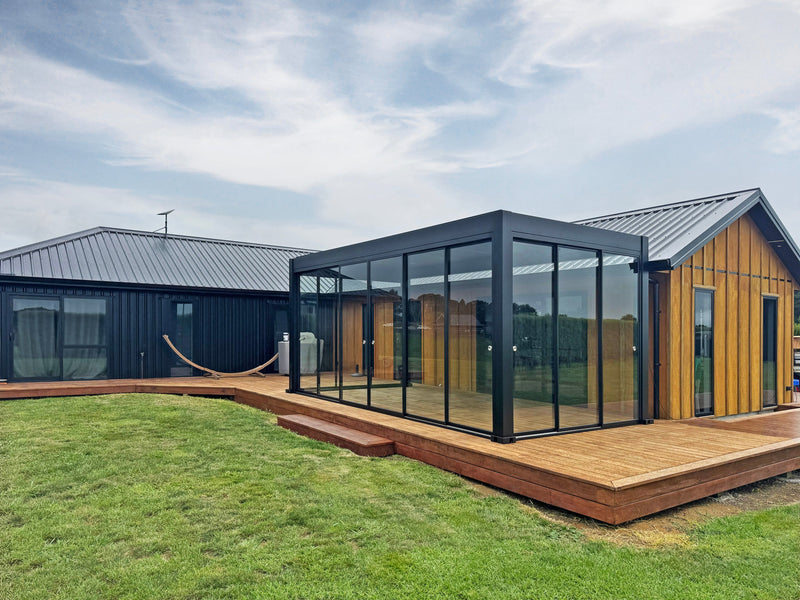 Enclosing Luke’s Exposed Deck with a Glass Louvre Roof
